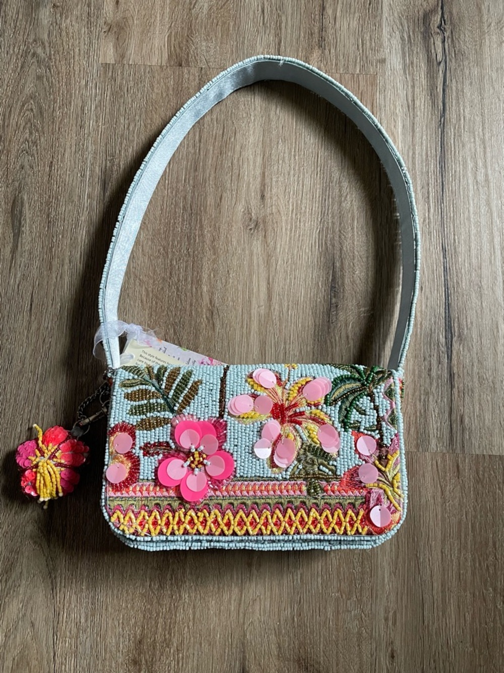 Brand new hibiscus beaded bag